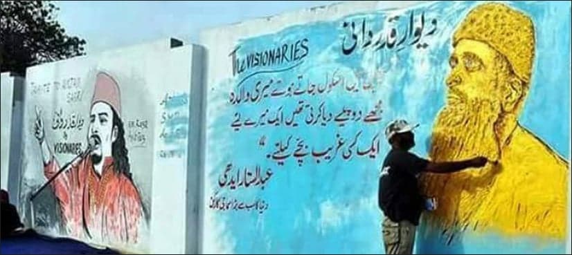 Korangi resident paint Edhi's mural at Wall of Kindness