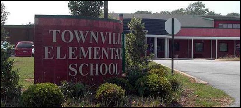 Three injured in US school shooting after teen suspect kills father