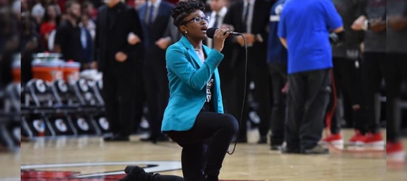 Singer kneels while performing anthem at Miami NBA game