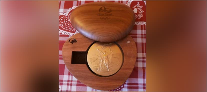 Olympian's thanks for medal found in rubbish heap