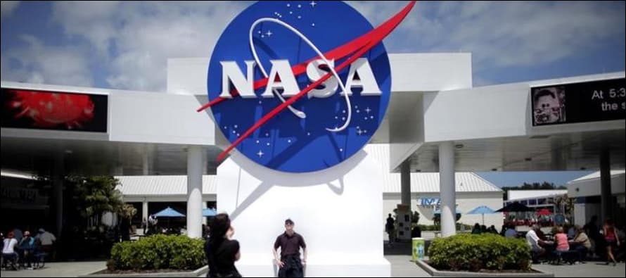 Trump asks NASA to explore putting crew on rocket's debut flight