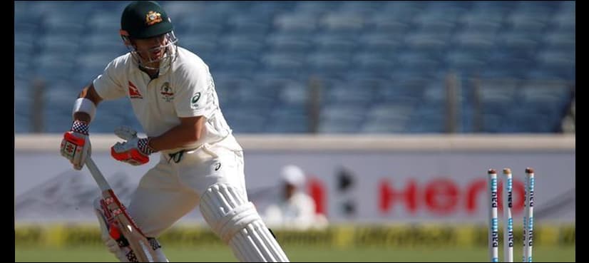 Warner bites his tongue, hopes to let bat do the talking