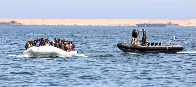 At least 97 migrants missing as boat sinks off Libya