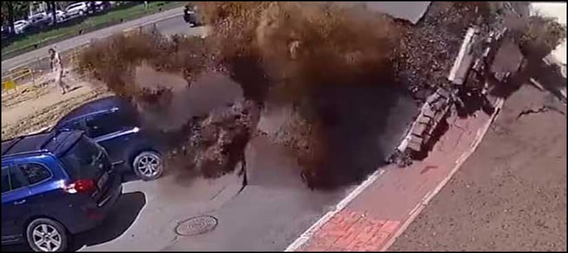 WATCH: Huge water pipe explosion damages cars, smashes windows in Ukraine