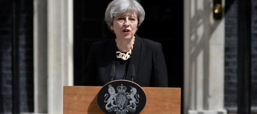 May vows crackdown after van hits Muslims near London mosque
