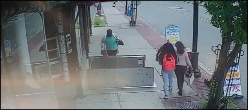 WATCH: Woman distracted by phone falls into basement