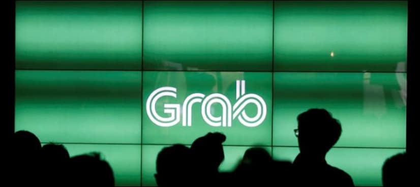 Malaysia legalizes e-hailing services as Grab, Uber compete