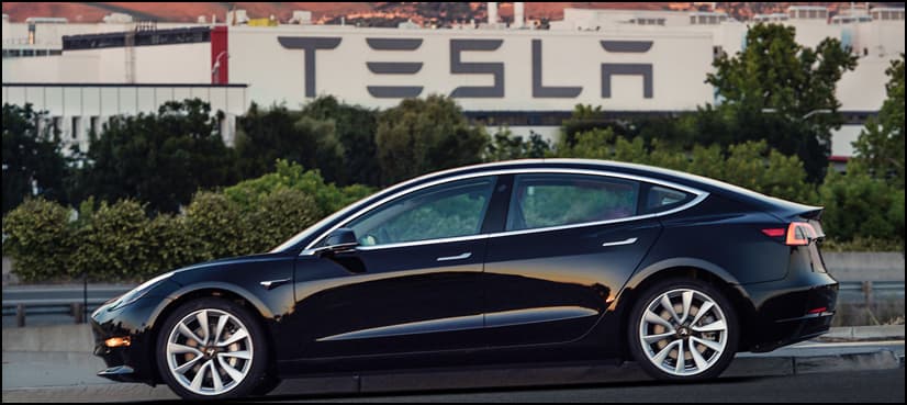 Tesla begins to deliver model for the masses