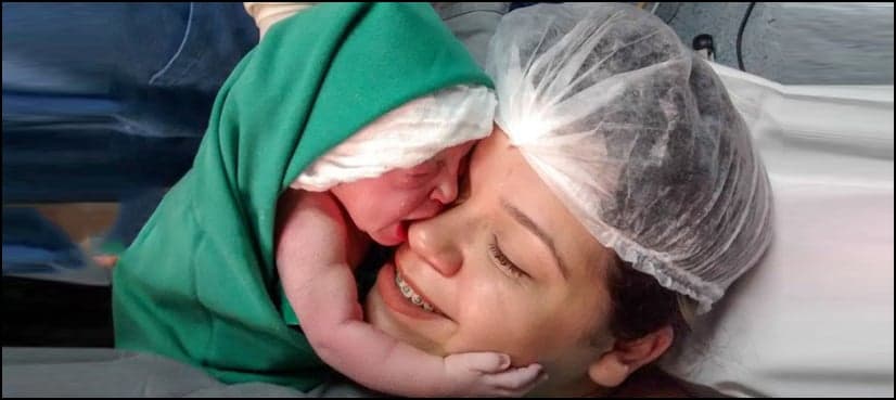 Heart-warming: Baby hugs mother seconds after birth in viral video
