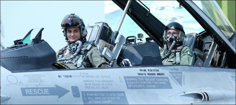 PM Abbasi visits air base in Sargodha, flies in F-16