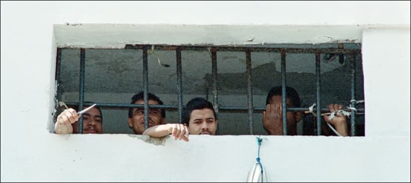 Three journalists arrested over Venezuela prison report