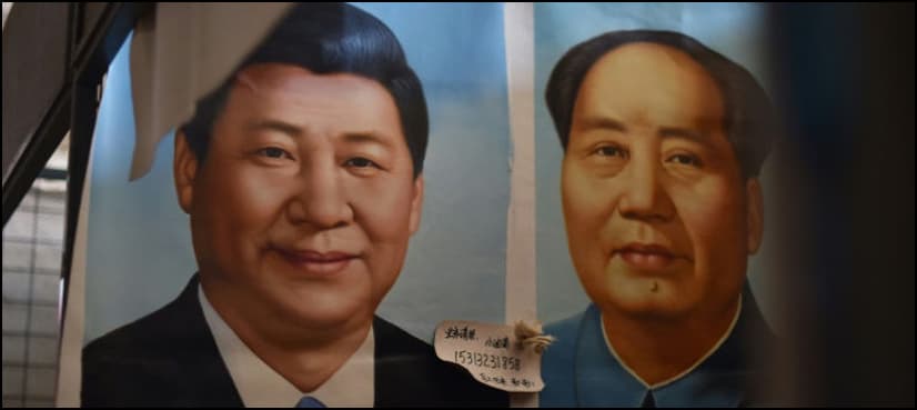 Xi joins Mao in Communist constitution, tightening grip on China