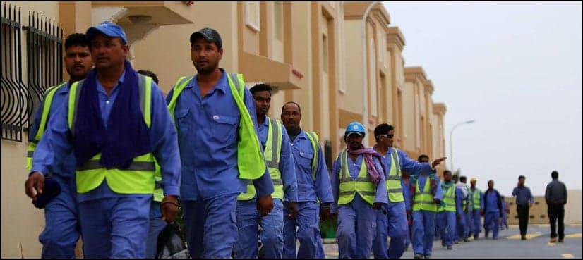 Qatar raises minimum wage, lifts curbs on changing jobs