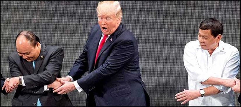 WATCH: Trump gets confused in cross-body handshake at ASEAN Summit