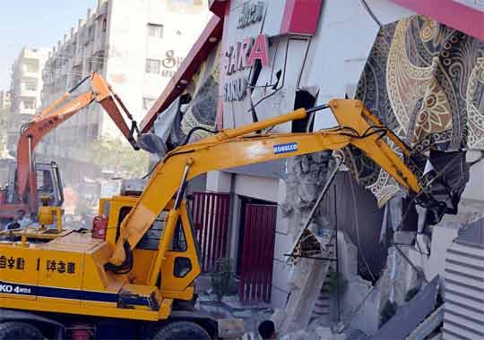 Illegal marriage lawns being demolished in Karachi