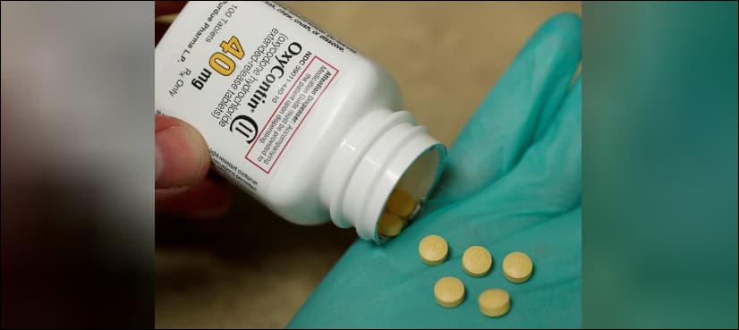 OxyContin maker stops promoting opioids, cuts sales staff