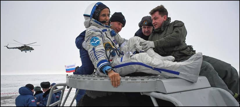 U.S.-Russian crew returns from space station: NASA TV