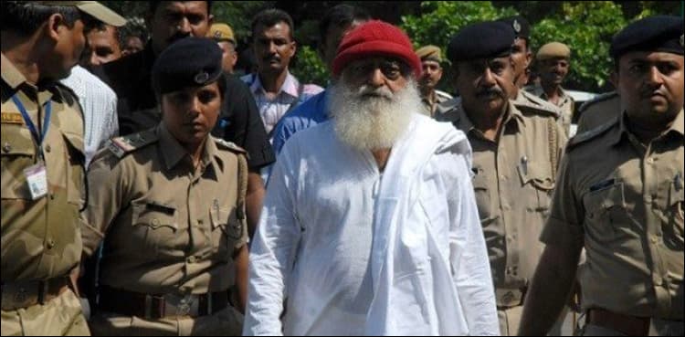 Indian court jails popular guru for life over teen rape