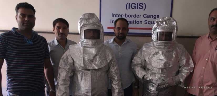 Police parade 'space suit' scammers after NASA claims exposed