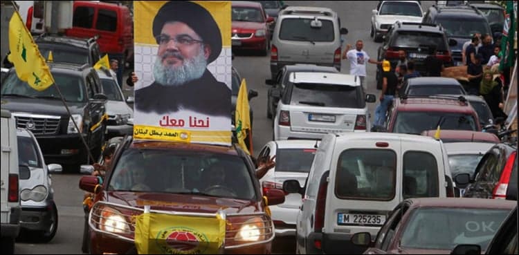 South Beirut residents hail Hezbollah 'victory' as they return home