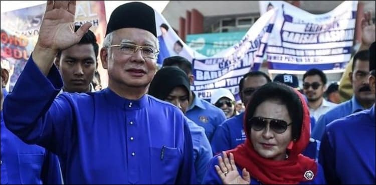 Malaysia seizes cash, jewels, designer bags in raid on ex-leader
