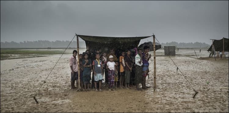 First monsoon rains pound Rohingya camps