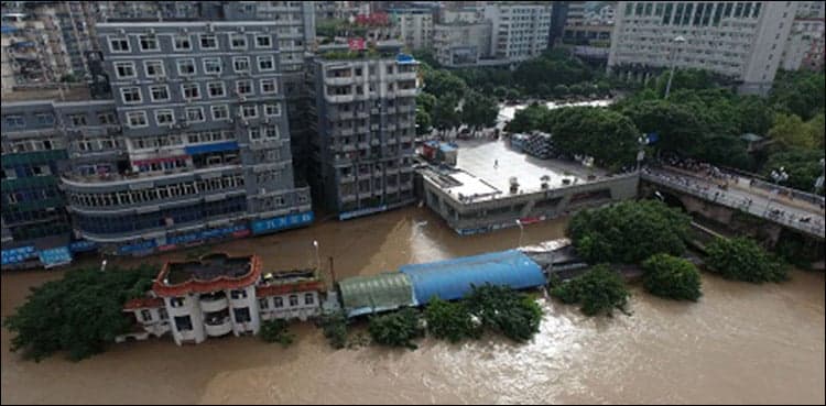 China floods wreak havoc, block roads and railways; more rain due