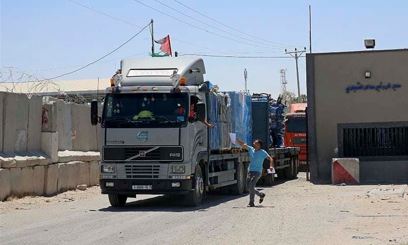 Israel reopens Gaza crossing as truce talks progress