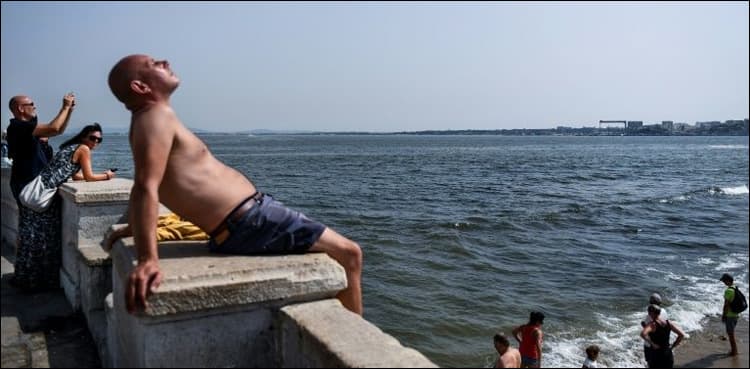 Melted asphalt, shoes for dogs: Europe wilts in heat