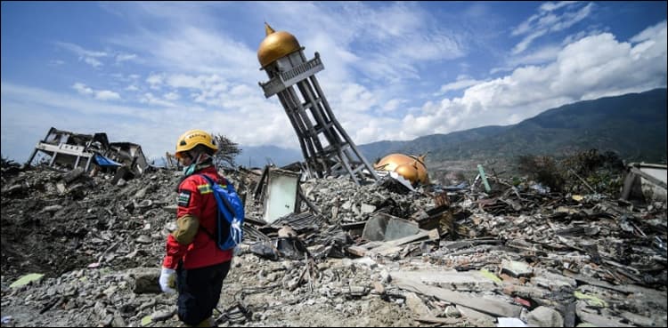 Indonesia mulls leaving quake-flattened villages as mass graves