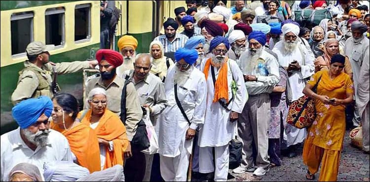 Sikh pilgrims return to India after attending Guru Nanak's birth anniversary