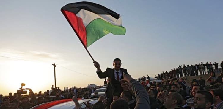 Four killed as thousands protest at border, but Gaza-Israel truce holds