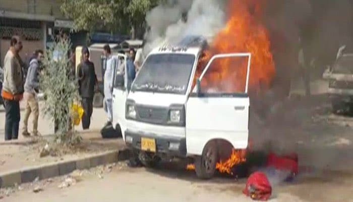 Minor girl, driver injured as school van catches fire in Karachi