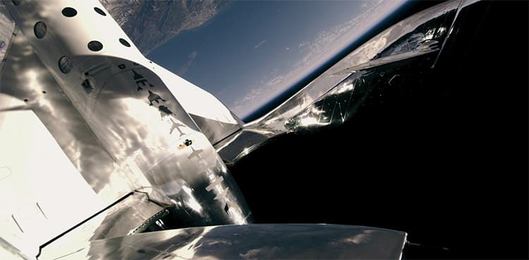 In a first, a plane soars to the edge of space with a passenger