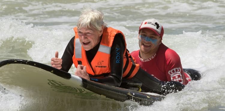 In South Africa, disabled surfers thrill at catching a wave