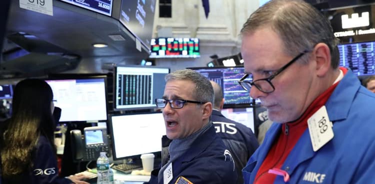 Wall Street drops as investors await outcome of critical trade talks