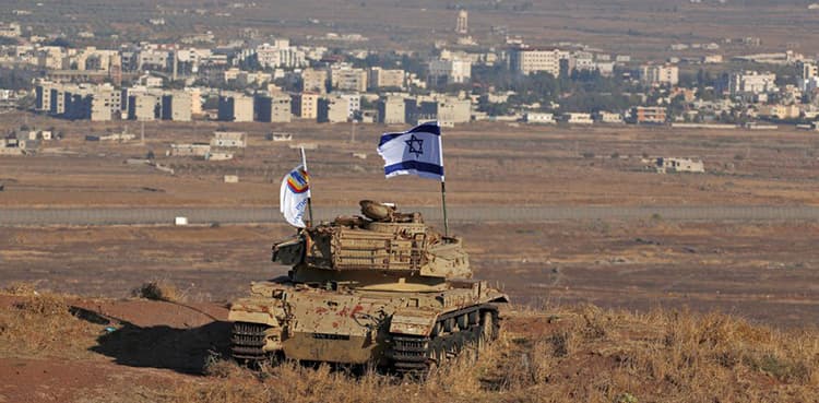 Israel strikes Syria after rocket fire on annexed Golan