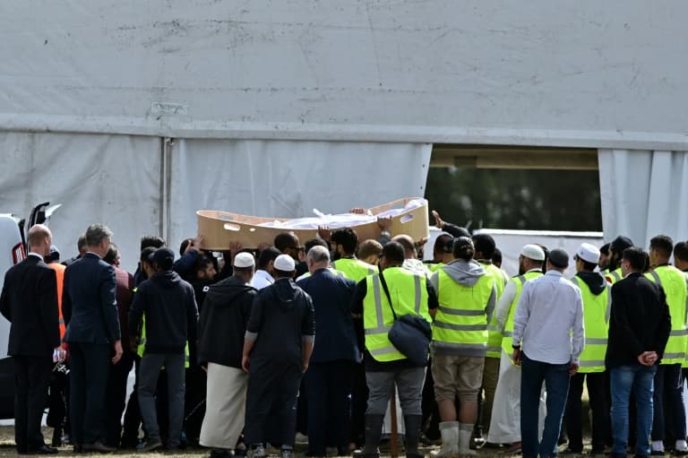 Syrian refugee father and son buried as New Zealand funerals begin