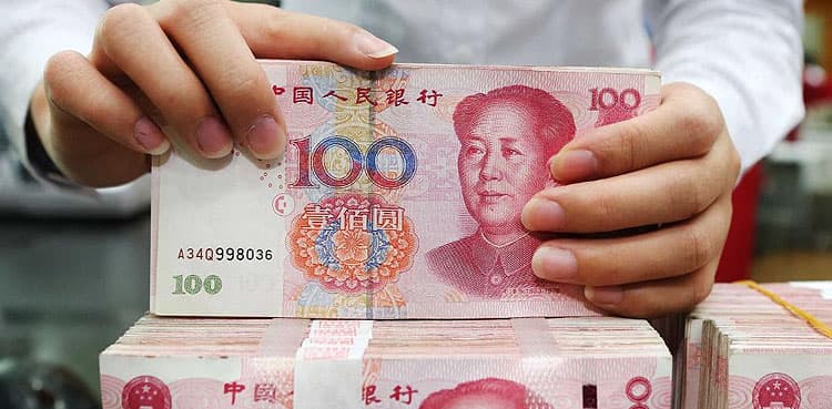 China yuan slides to four-month low