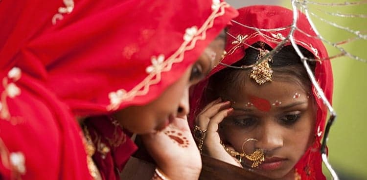 President Zardari signs bill criminalizing child marriage into law