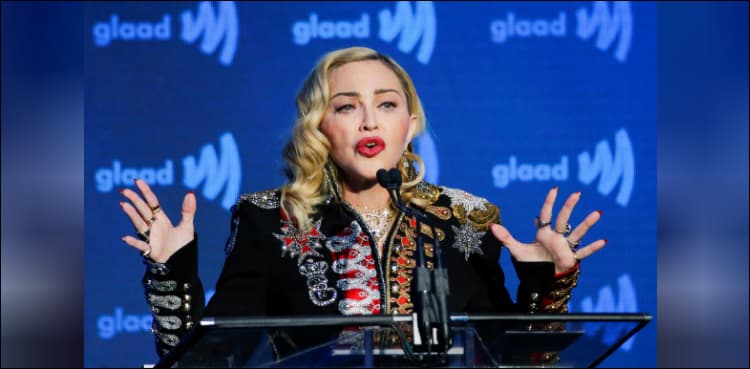 Madonna issues 'wake up' call on gun violence in graphic music video