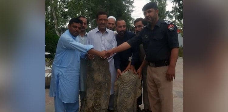Two Buddha era statues recovered from Mardan's graveyard