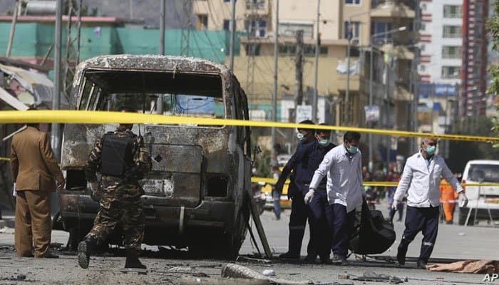 Afghanistan highway blast kills at least 34 on bus, injures 17