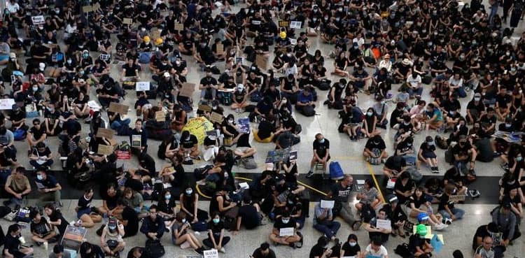 Hong Kong police arrest 29 after overnight clashes, more protests planned
