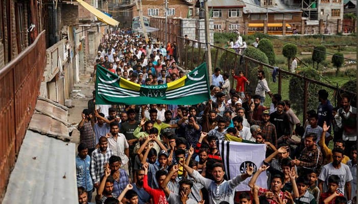 Besieged Kashmiri neighbourhood in test of wills with India's Modi