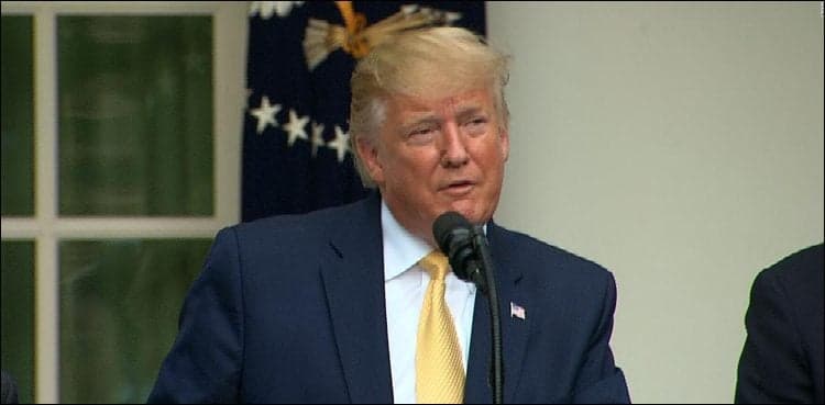 Impeachment pressure grows, Trump remains defiant
