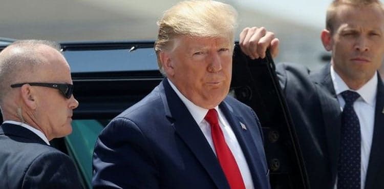 US President denounces impeachment inquiry against him as 'coup'