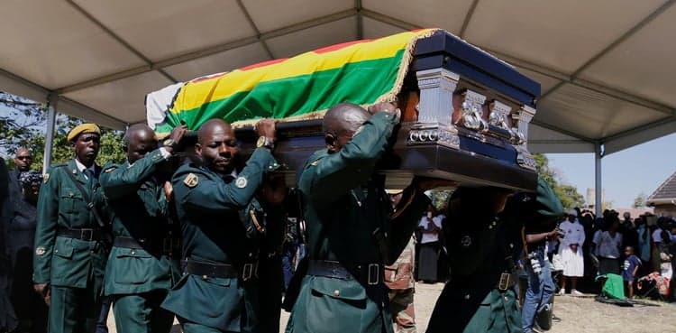 Zimbabwe's Mugabe buried in home village, ending an era