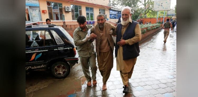 Blasts collapse roof at Afghan mosque, killing at least 62 at Friday prayers