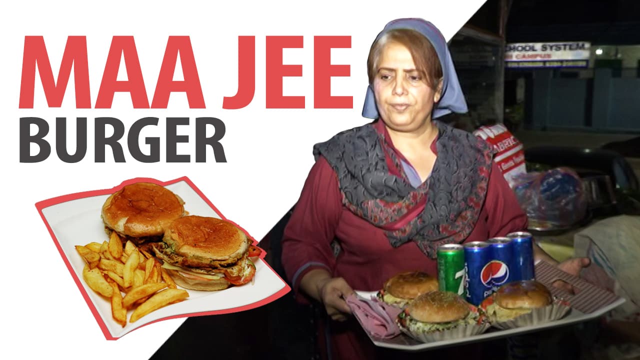 50-year-old women, Sabeela Bibi who runs a Maa Jee Burger stall to support her family